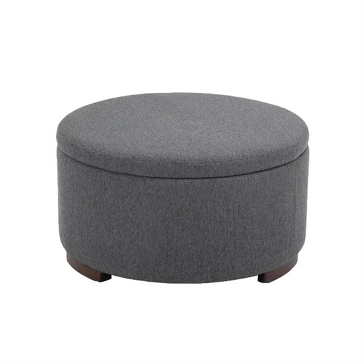 Tela gris otomana redonda cómoda